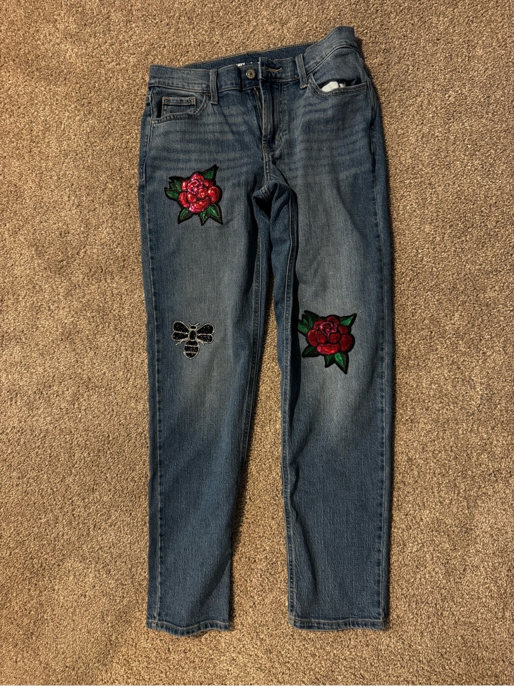 Old Navy denim boyfriend jeans with red rose and black bee patches